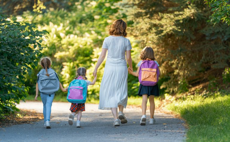 Parent and pupils are going to school